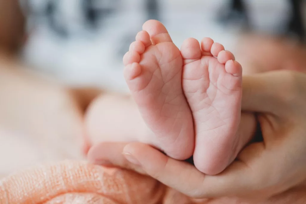 Pigeon toes Treatment, cute newborn closeup