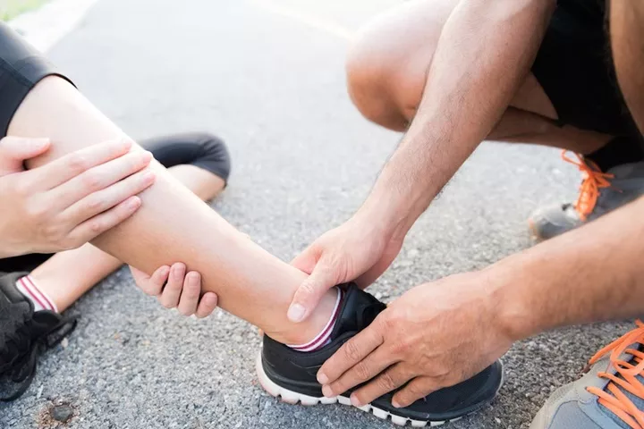 Sports Injuries to the Foot and Ankle women injured