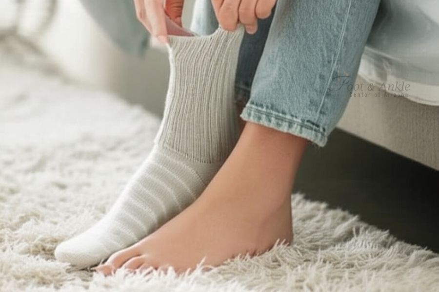 why do my feet smell like vinegar