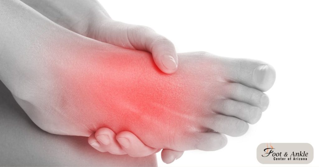 What causes pain on top of foot